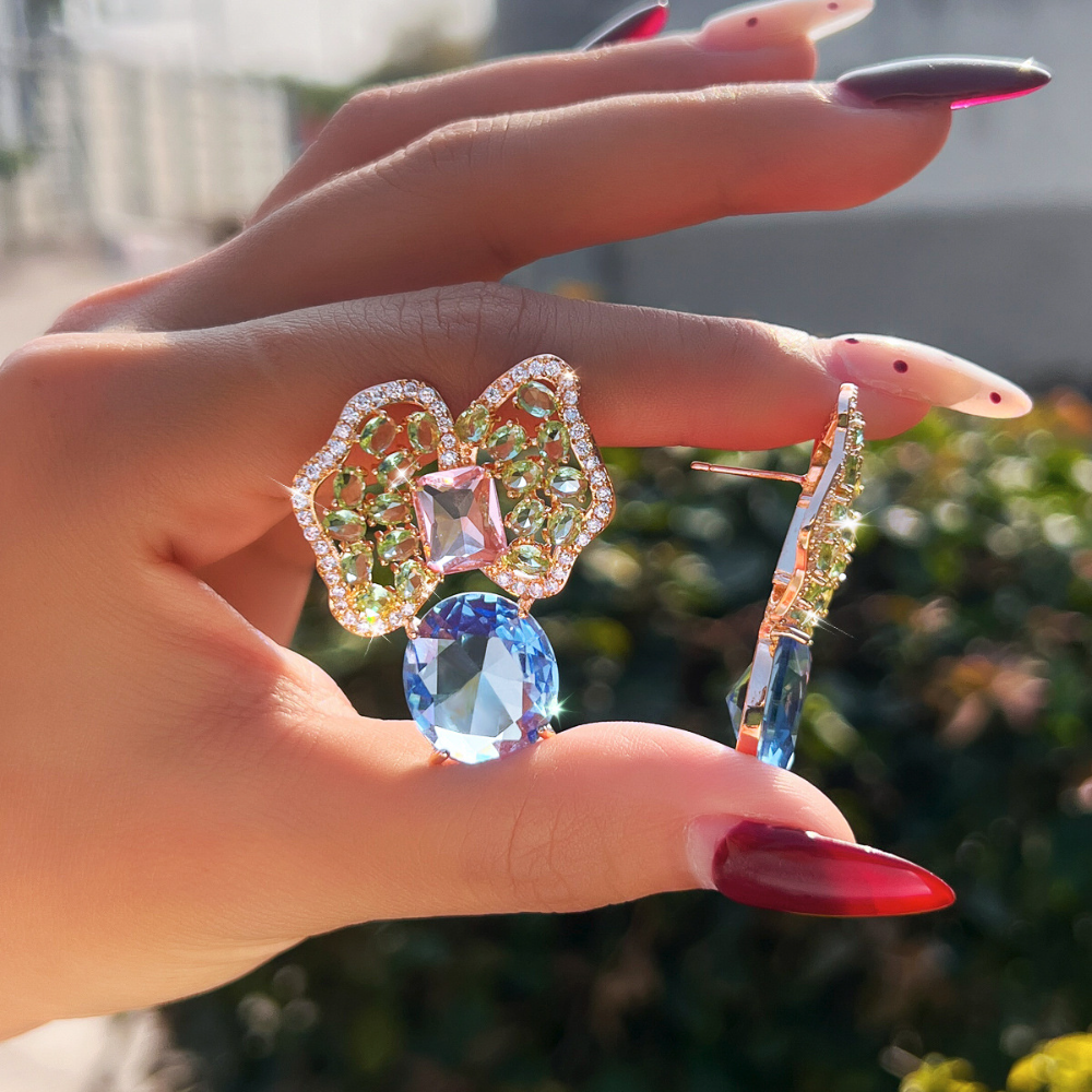 925 silver fine luxury butterfly knot zirconia stud earrings fashionable geometric irregular colored zirconia petal luxury style earrings