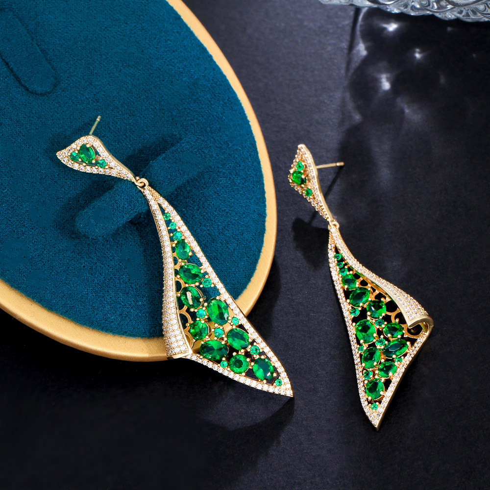 S925 silver jewelry - European Heavy Industry brand. Personalized green emerald earrings Trendy and luxurious featuring lightweight and high-end design With dangling zircon stones