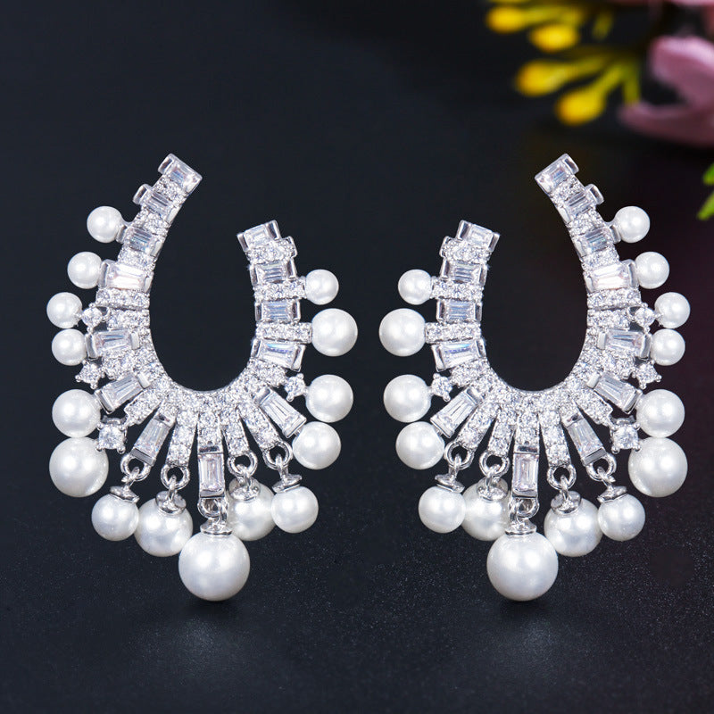 Korean fashionable pearl jewelry - S925 silver needle with micro-set zirconia hollow design luxurious lightweight earrings and ear pendants