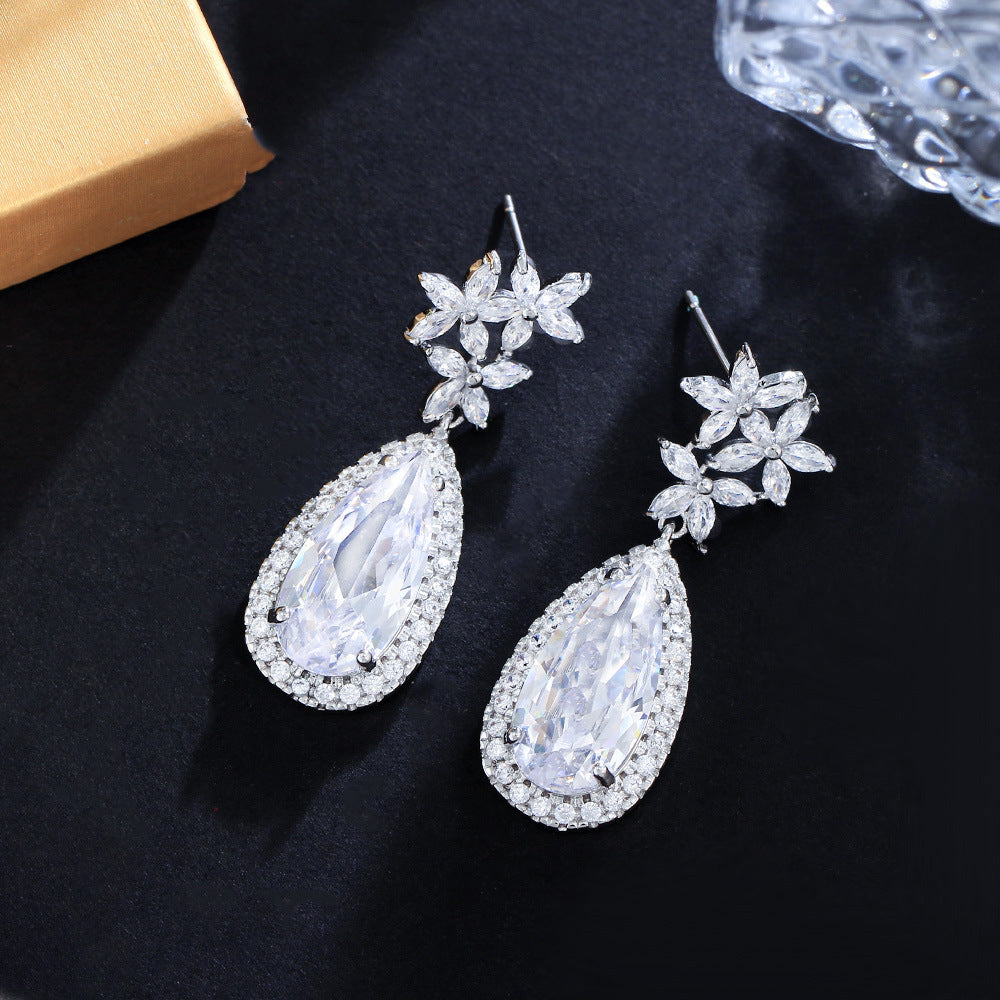 Classic flower-shaped zircon earrings with droplet-shaped micro-set pendants electroplated brass fashionable and trendy accessories
