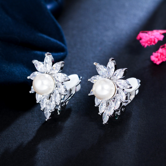 Korean version of fashionable pearl ear clips Yellow copper electroplated with white gold with oval-shaped zirconia stones. Ear jewelry
