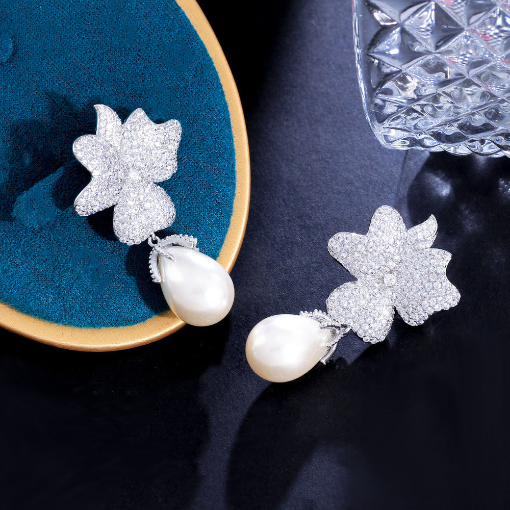 S925 silver jewelry - Korean Dongdaemun high-end style zircon flower-shaped pearl earrings - unique and exclusive ultra-bright earrings and stud earrings