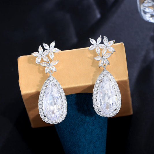 Classic flower-shaped zircon earrings with droplet-shaped micro-set pendants electroplated brass fashionable and trendy accessories