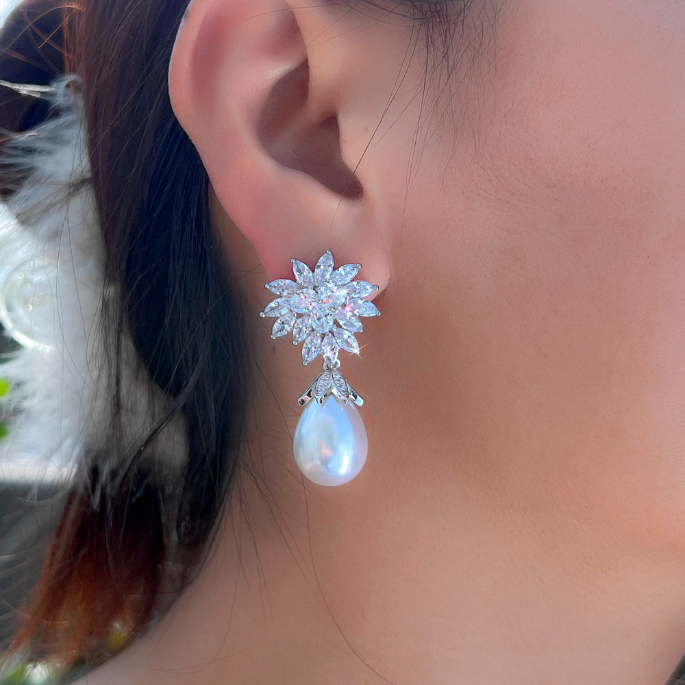 Luxury-sleek fashion snowflake pearl zirconia earrings - elegant ear ornaments for formal weddings and banquets, suitable for brides' gowns.