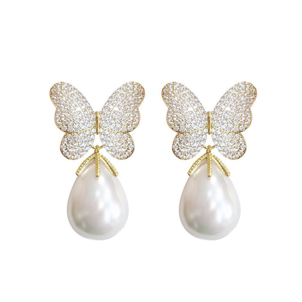 French-style bow-shaped pearl earrings with a sweet and elegant look featuring three-dimensional micro-set zirconia stones S925 silver stud earrings an extremely enchanting accessory