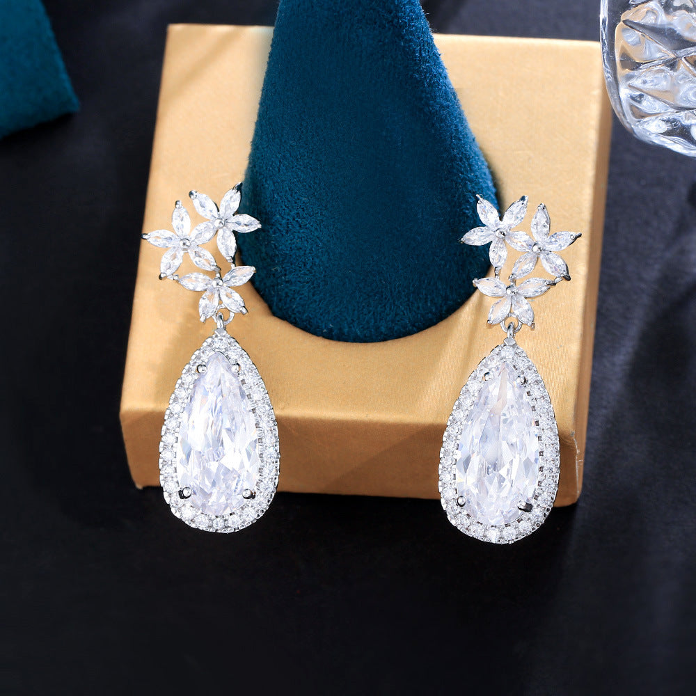 Classic flower-shaped zircon earrings with droplet-shaped micro-set pendants electroplated brass fashionable and trendy accessories