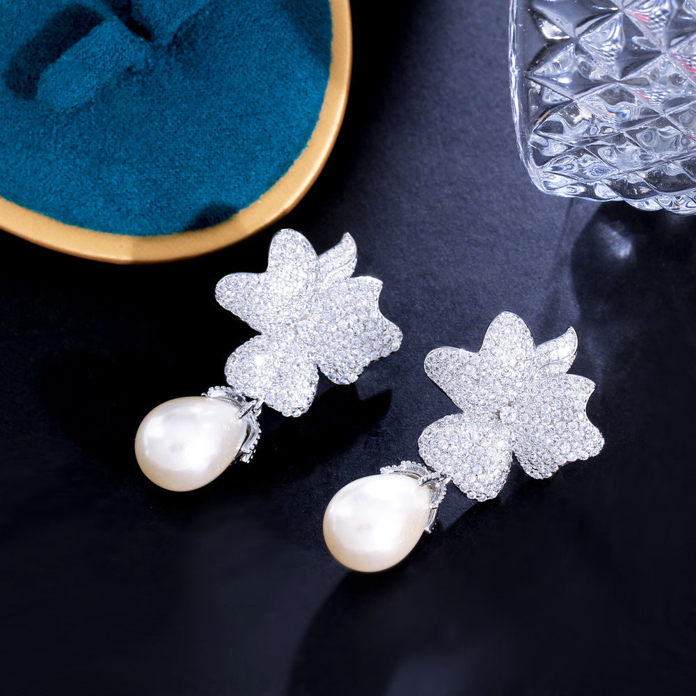 S925 silver jewelry - Korean Dongdaemun high-end style zircon flower-shaped pearl earrings - unique and exclusive ultra-bright earrings and stud earrings