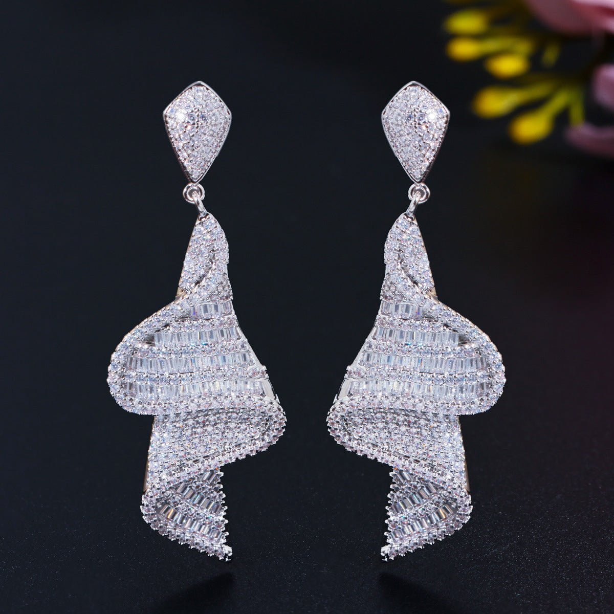 S925 silver needle style European geometric spiral-shaped earrings featuring glittering micro-set zirconia a unique long-length earpiece accessory