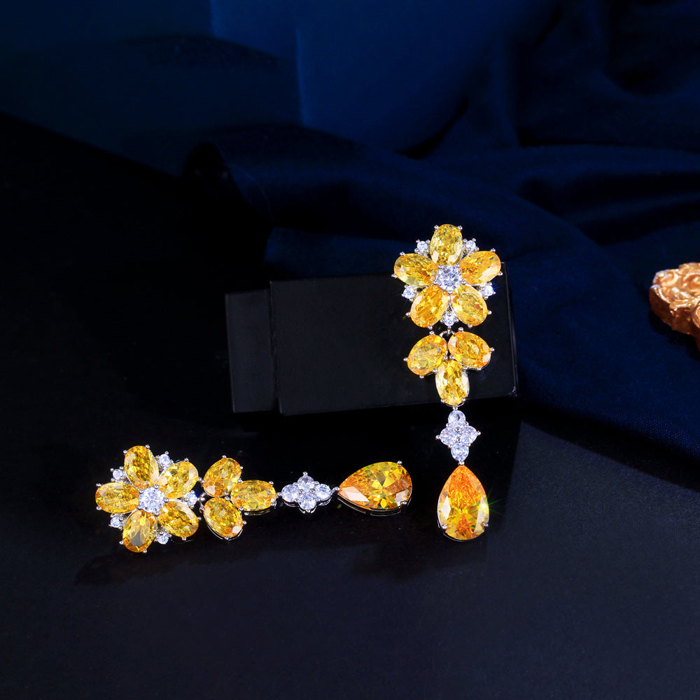 Japanese and Korean minimalist luxury long-flowing flower-shaped drop zirconia earrings with abundant diamonds, featuring elegant and versatile style, perfect for all occasions. Ear jewelry.