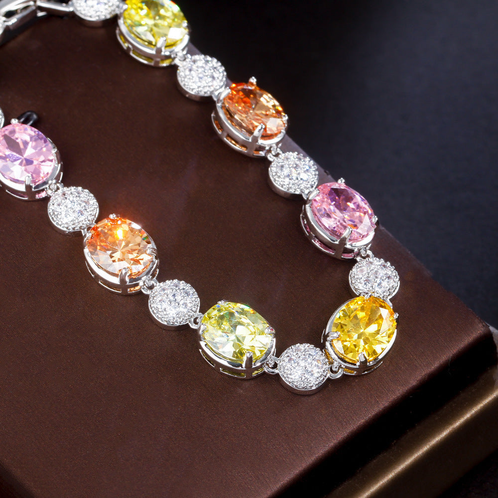 Bronze electroplated with 18K gold with colored diamonds and zirconia High-end jewelry Yellow gemstone women's handpiece