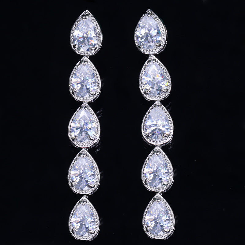 Korean version of European-style minimalist fashion earrings Long AAA zirconium electroplated white K waterdrop earrings
