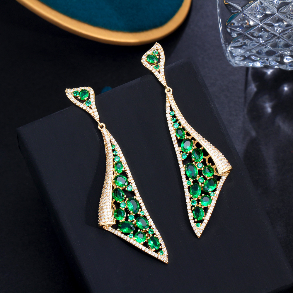 S925 silver jewelry - European Heavy Industry brand. Personalized green emerald earrings Trendy and luxurious featuring lightweight and high-end design With dangling zircon stones