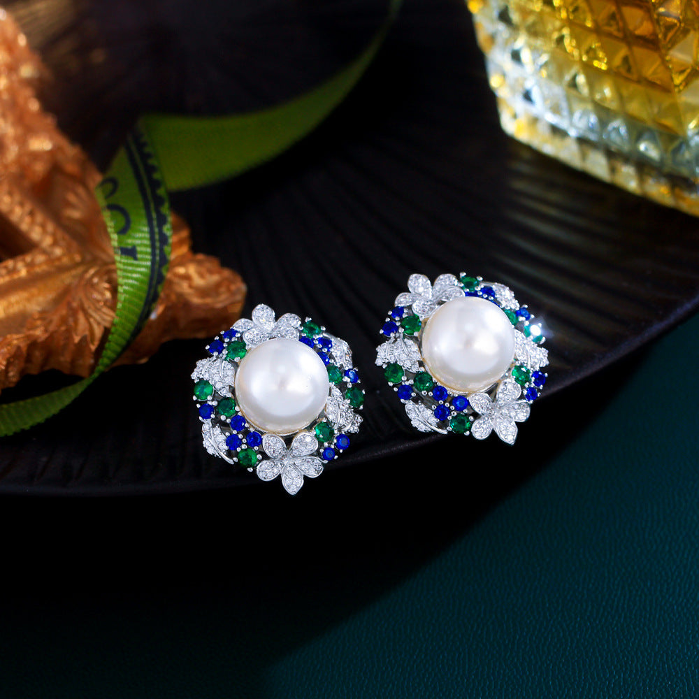 S925 silver filigree light luxury emerald sunflower pearl earrings - a unique piece featuring zirconium stone inlaid flower-shaped earrings
