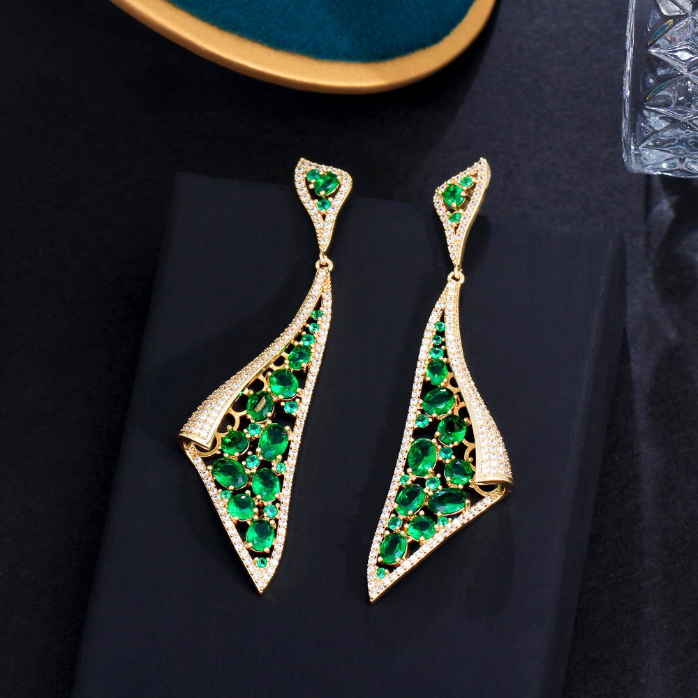 S925 silver jewelry - European Heavy Industry brand. Personalized green emerald earrings Trendy and luxurious featuring lightweight and high-end design With dangling zircon stones