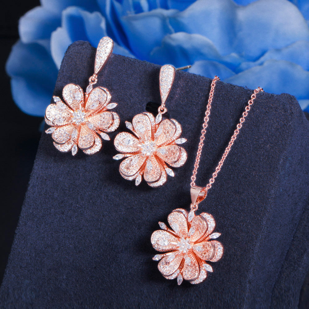 European and American minimalist diamond-set rose gold flower-shaped earrings pendant set - ultra-shiny zirconia women's accessories