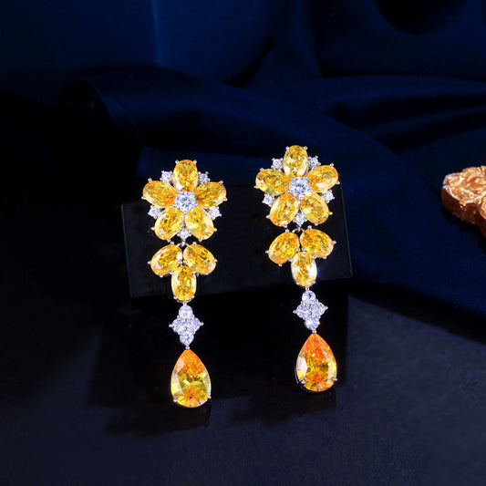 Japanese and Korean minimalist luxury long-flowing flower-shaped drop zirconia earrings with abundant diamonds, featuring elegant and versatile style, perfect for all occasions. Ear jewelry.