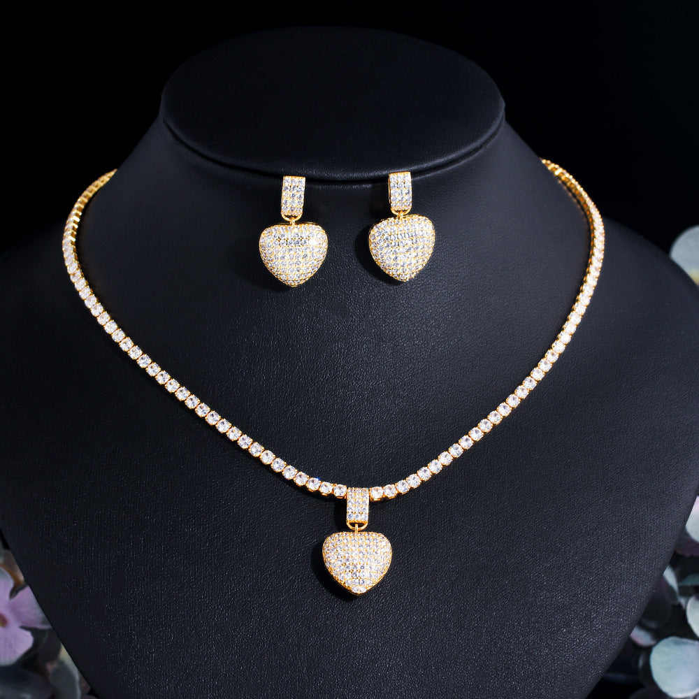 Two sets of matching earrings and necklaces featuring Korean-style pop-style heart-shaped micro-set zirconia and full diamonds This set is suitable for wedding brides and heart-shaped pendant necklaces