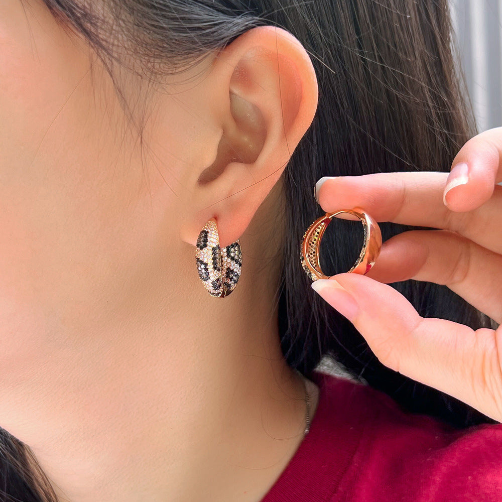 European and American style personalized light luxury snake pattern and leopard pattern micro-set zirconia ear studs in two-color electroplating with full-diamond embellishments double-color electroplated ear jewelry