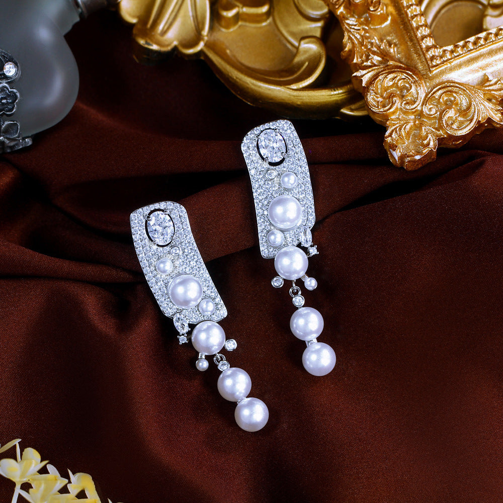 S925 silver filigree vintage royal style elegant zircon and pearl stud earrings with high-end design and elegant appearance as an earpiece set