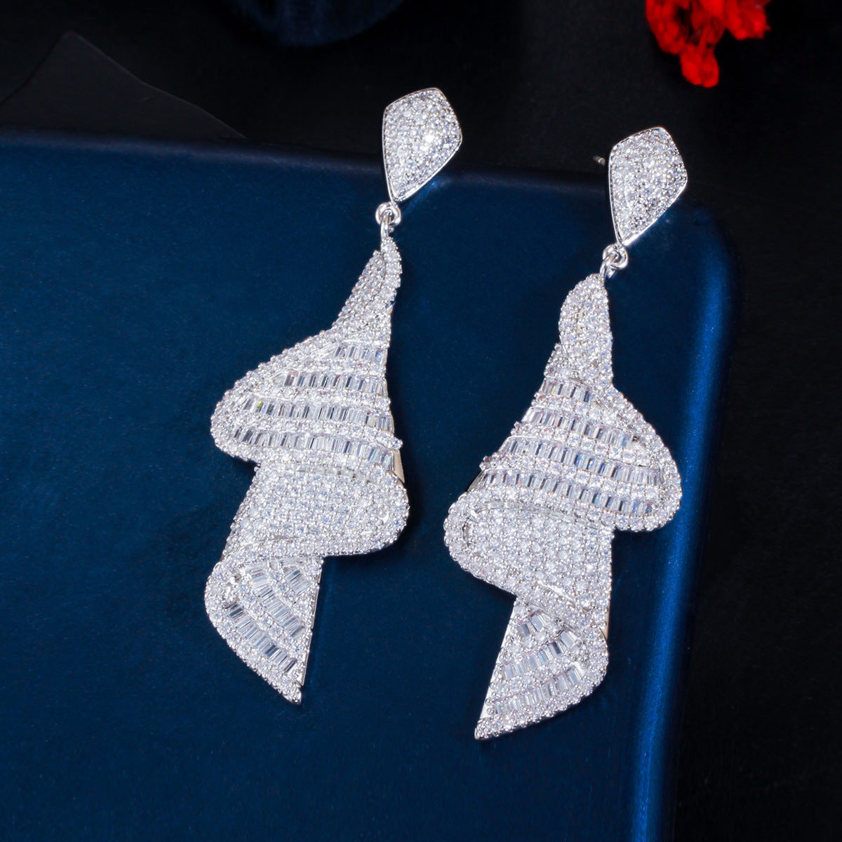 S925 silver needle style European geometric spiral-shaped earrings featuring glittering micro-set zirconia a unique long-length earpiece accessory