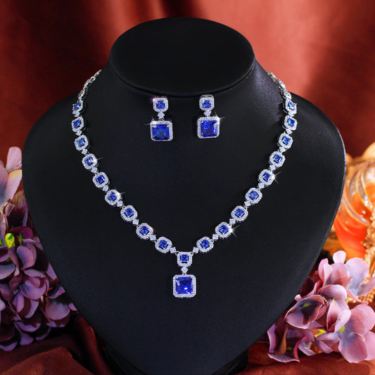 High-end luxury jewelry set featuring exquisite square zirconia pieces This includes a wedding dress necklace earrings and a matching chain perfect for an elegant evening event