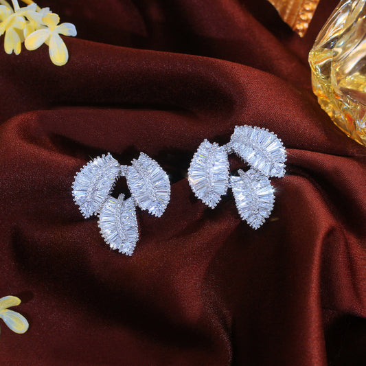 Luxury-sleek and enchanting Korean and Japanese shiny three-dimensional leaf earrings highly versatile and suitable for all occasions featuring small inlay of zirconia unique ear jewelry
