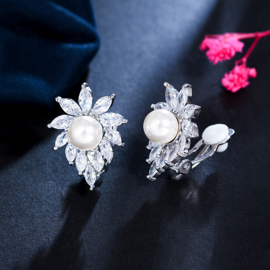 Korean version of fashionable pearl ear clips Yellow copper electroplated with white gold with oval-shaped zirconia stones. Ear jewelry
