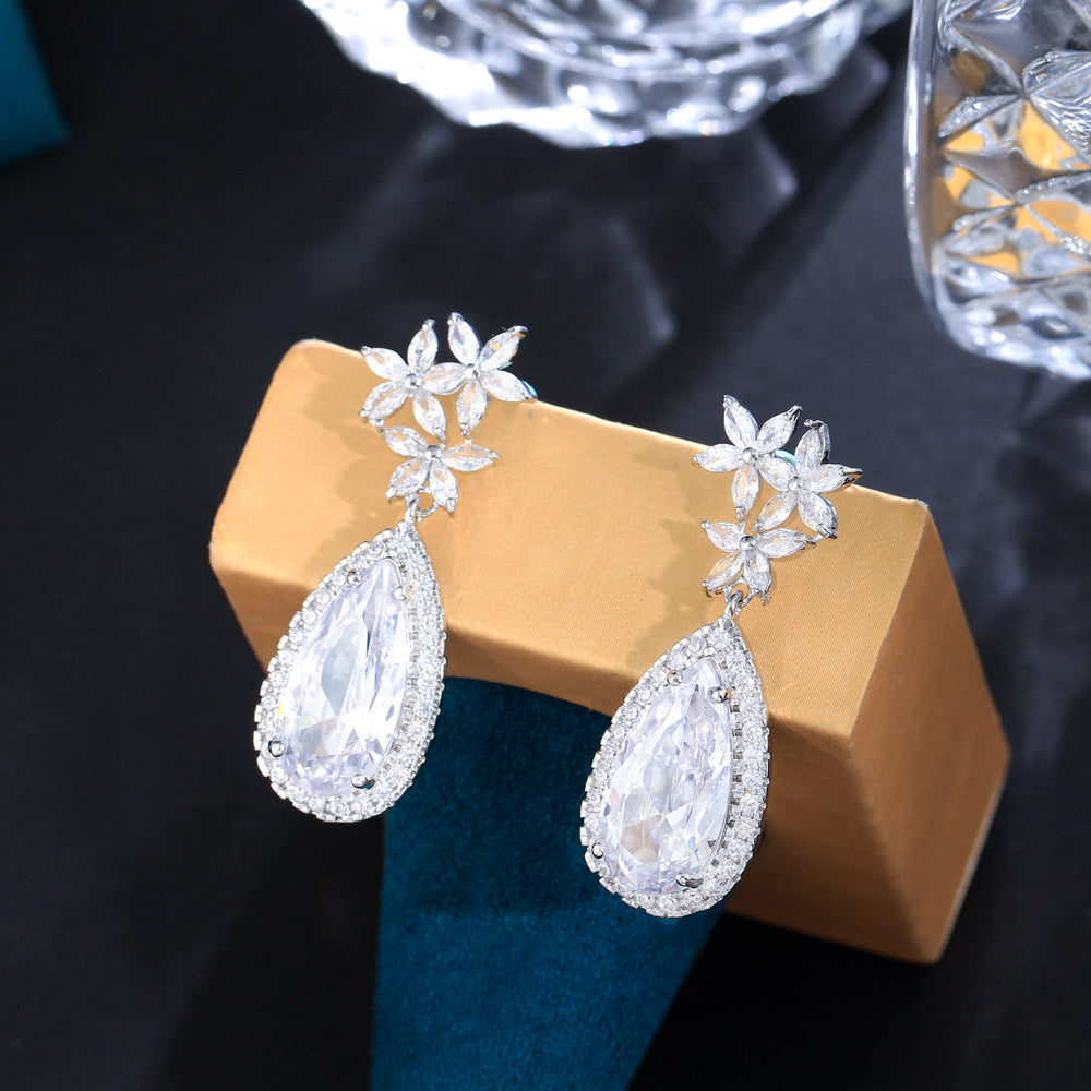 Classic flower-shaped zircon earrings with droplet-shaped micro-set pendants electroplated brass fashionable and trendy accessories
