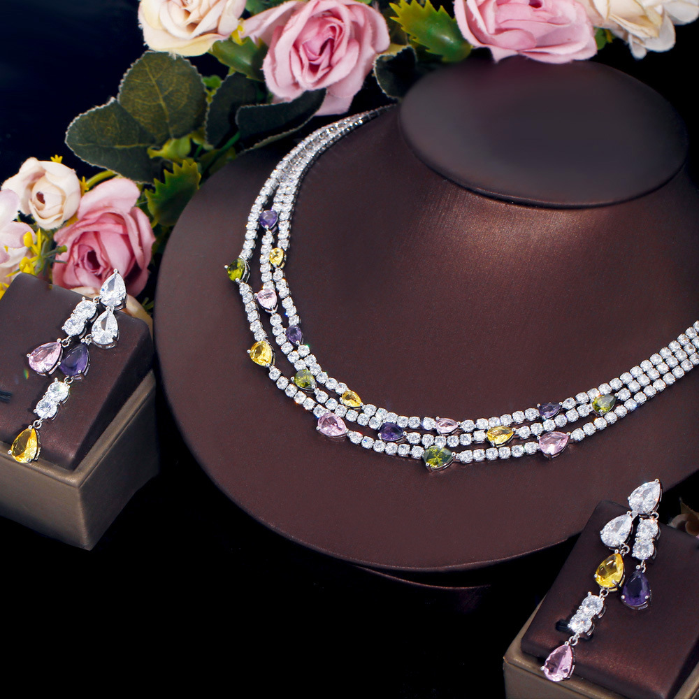 French-style minimalist luxury diamond evening dress necklace with multiple layers of diamond drop collar chain earrings and chain bracelet set