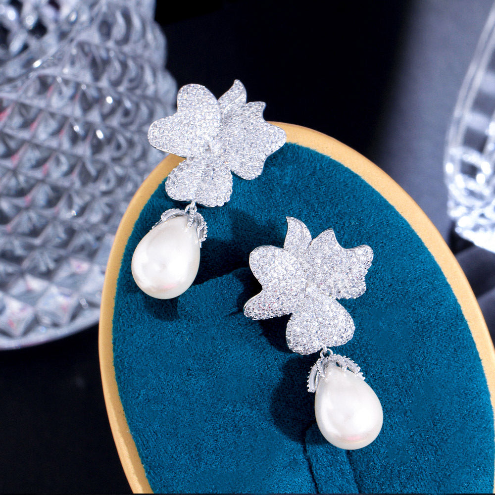 S925 silver jewelry - Korean Dongdaemun high-end style zircon flower-shaped pearl earrings - unique and exclusive ultra-bright earrings and stud earrings