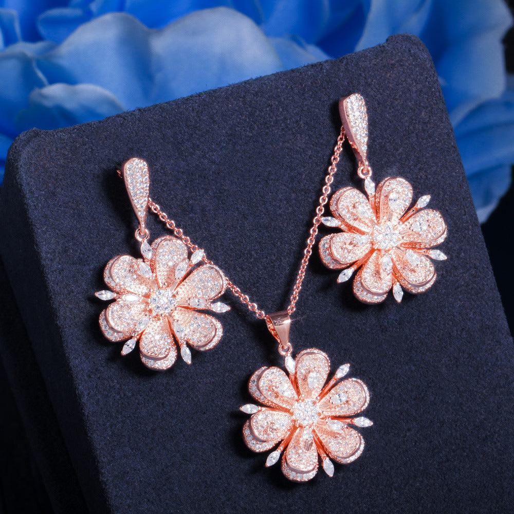 European and American minimalist diamond-set rose gold flower-shaped earrings pendant set - ultra-shiny zirconia women's accessories