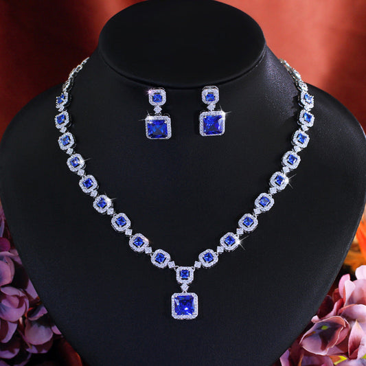 High-end luxury jewelry set featuring exquisite square zirconia pieces This includes a wedding dress necklace earrings and a matching chain perfect for an elegant evening event