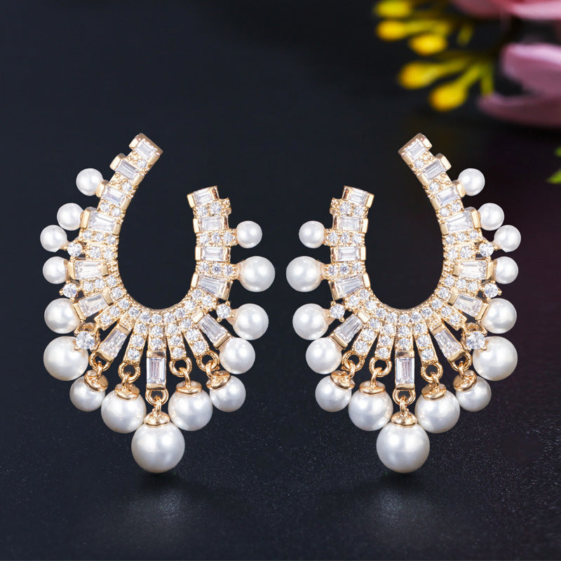 Korean fashionable pearl jewelry - S925 silver needle with micro-set zirconia hollow design luxurious lightweight earrings and ear pendants