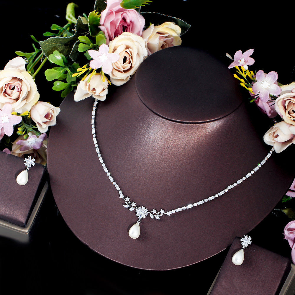 Korean version of light luxury minimalist niche design pearl collar chain with micro-set zirconia pearls and pearl earrings set. Set package