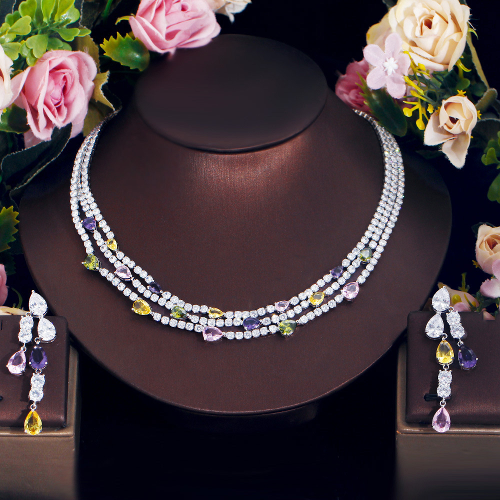 French-style minimalist luxury diamond evening dress necklace with multiple layers of diamond drop collar chain earrings and chain bracelet set