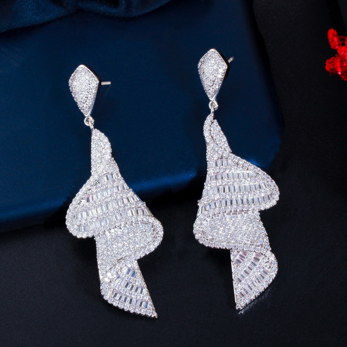 S925 silver needle style European geometric spiral-shaped earrings featuring glittering micro-set zirconia a unique long-length earpiece accessory