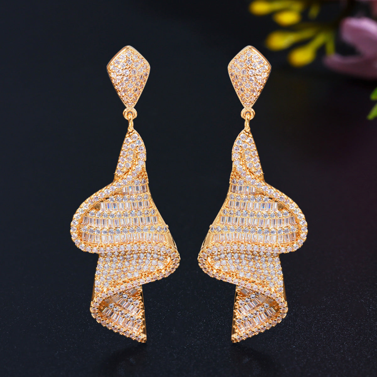 S925 silver needle style European geometric spiral-shaped earrings featuring glittering micro-set zirconia a unique long-length earpiece accessory