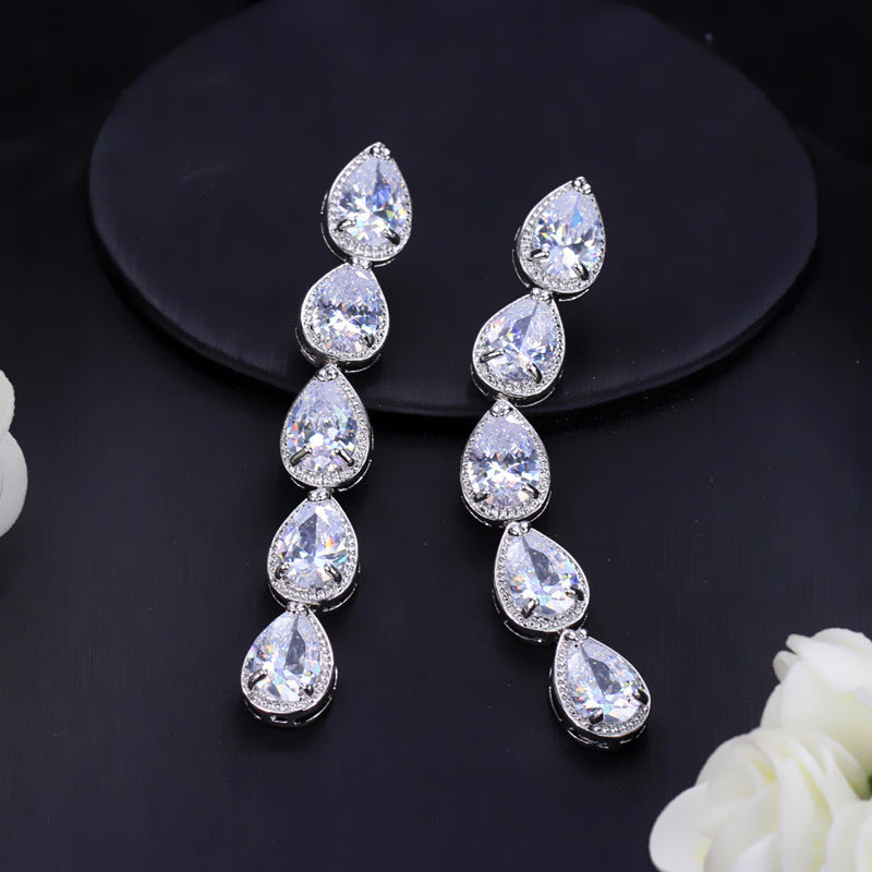Korean version of European-style minimalist fashion earrings Long AAA zirconium electroplated white K waterdrop earrings