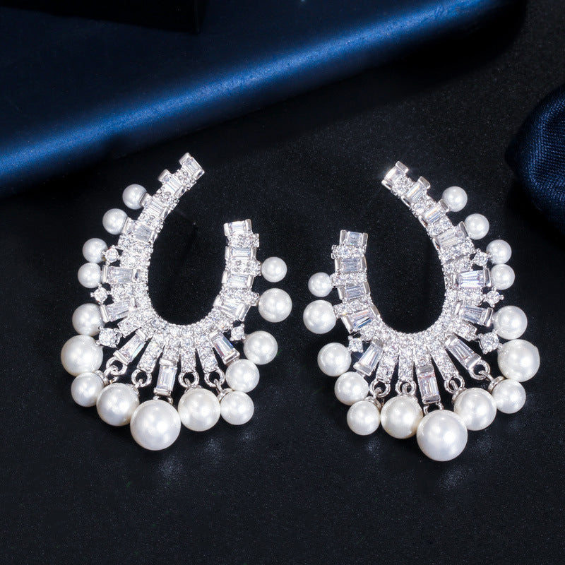 Korean fashionable pearl jewelry - S925 silver needle with micro-set zirconia hollow design luxurious lightweight earrings and ear pendants