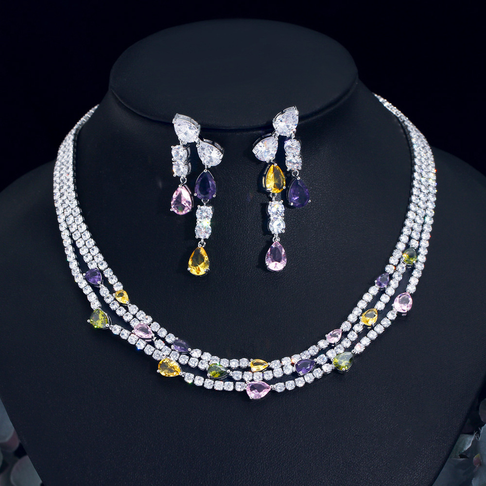 French-style minimalist luxury diamond evening dress necklace with multiple layers of diamond drop collar chain earrings and chain bracelet set