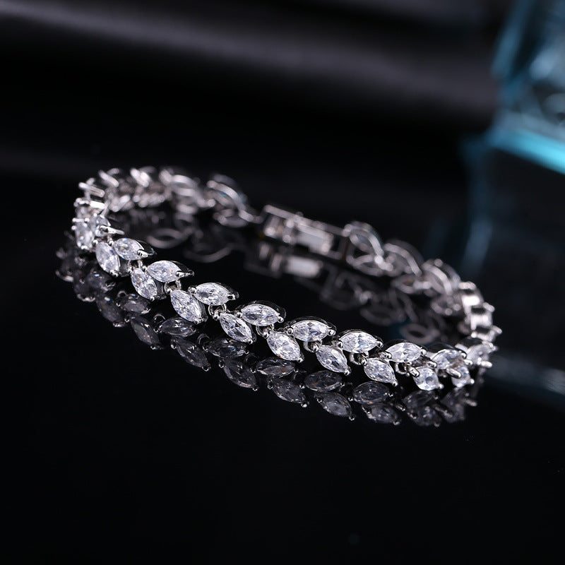 Korean version fashionable jewelry bracelet with small leaves and AAA-quality zircon stones size17.8cm