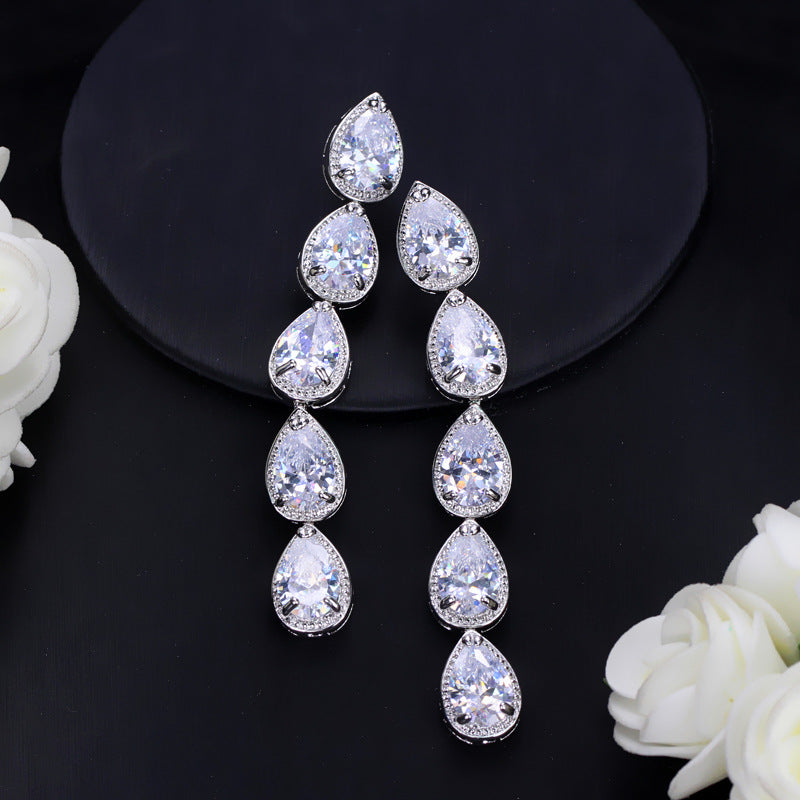 Korean version of European-style minimalist fashion earrings Long AAA zirconium electroplated white K waterdrop earrings