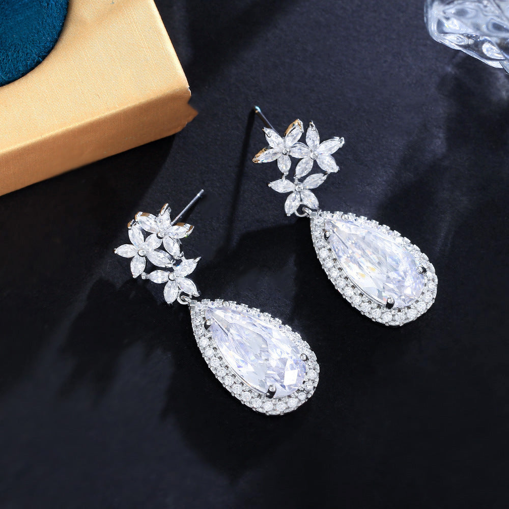 Classic flower-shaped zircon earrings with droplet-shaped micro-set pendants electroplated brass fashionable and trendy accessories