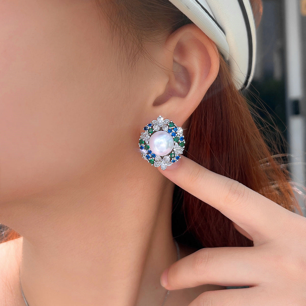 S925 silver filigree light luxury emerald sunflower pearl earrings - a unique piece featuring zirconium stone inlaid flower-shaped earrings