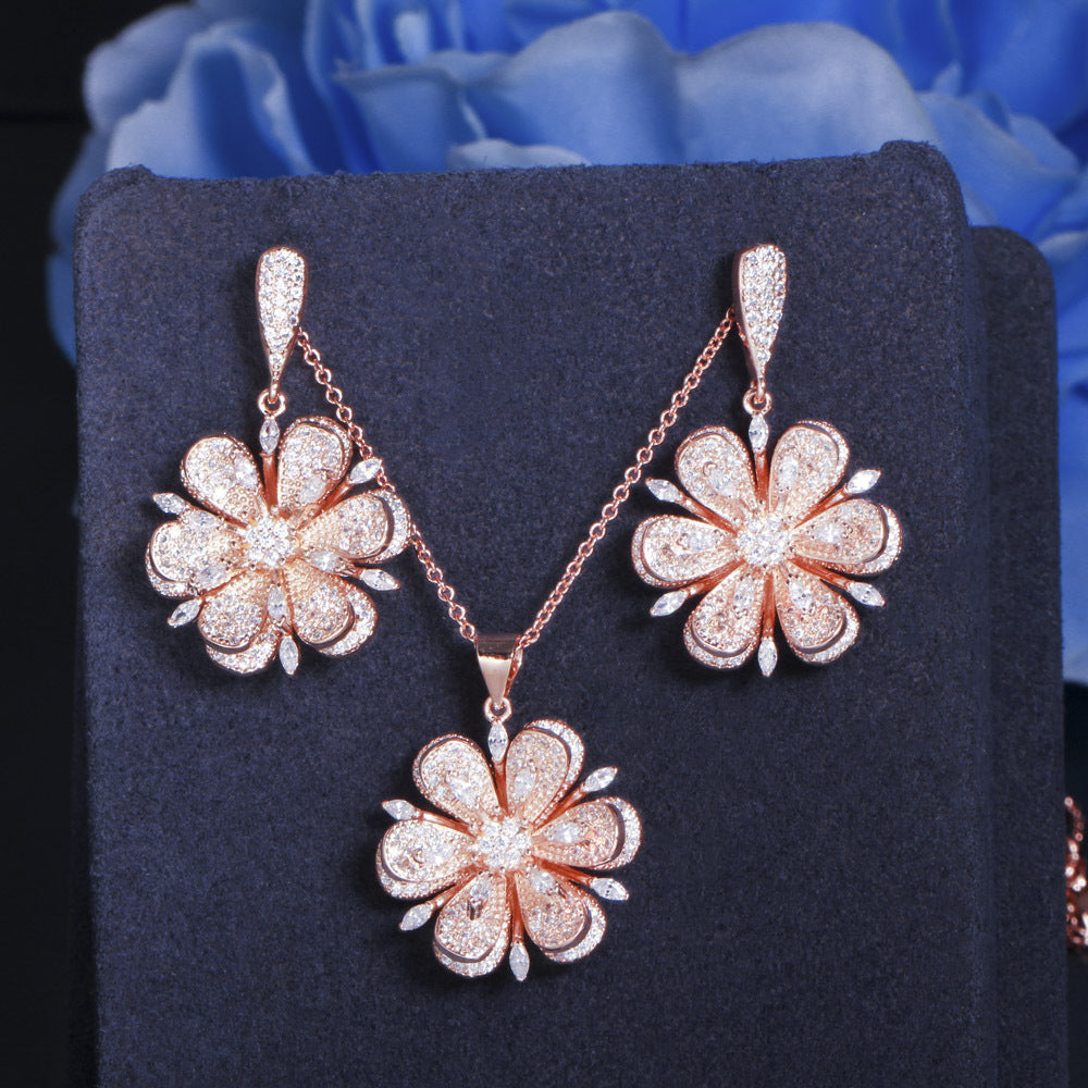 European and American minimalist diamond-set rose gold flower-shaped earrings pendant set - ultra-shiny zirconia women's accessories