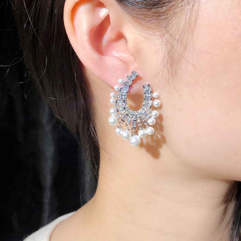 Korean fashionable pearl jewelry - S925 silver needle with micro-set zirconia hollow design luxurious lightweight earrings and ear pendants
