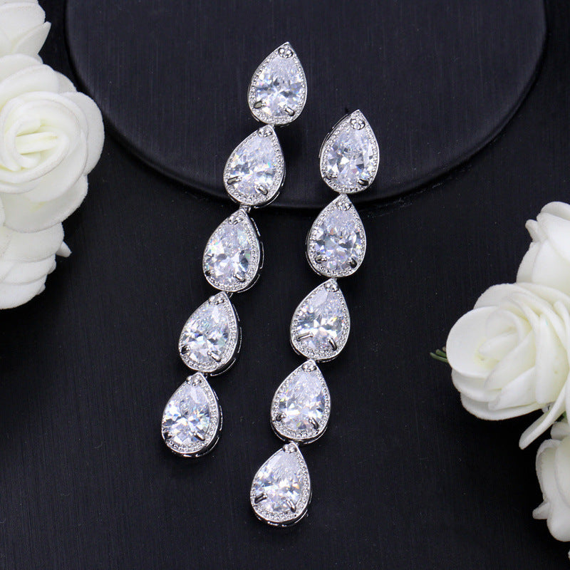 Korean version of European-style minimalist fashion earrings Long AAA zirconium electroplated white K waterdrop earrings
