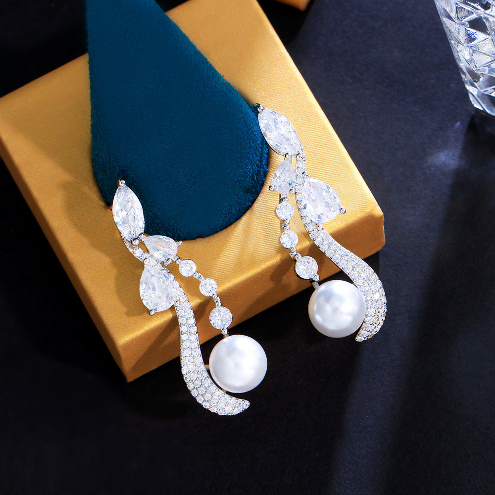 S925 silver needle minimalist and niche zircon twisted geometric pearl earrings, sweet and fashionable style full diamond drop earrings accessory